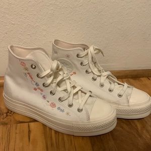 platform white converse with embroidered flowers